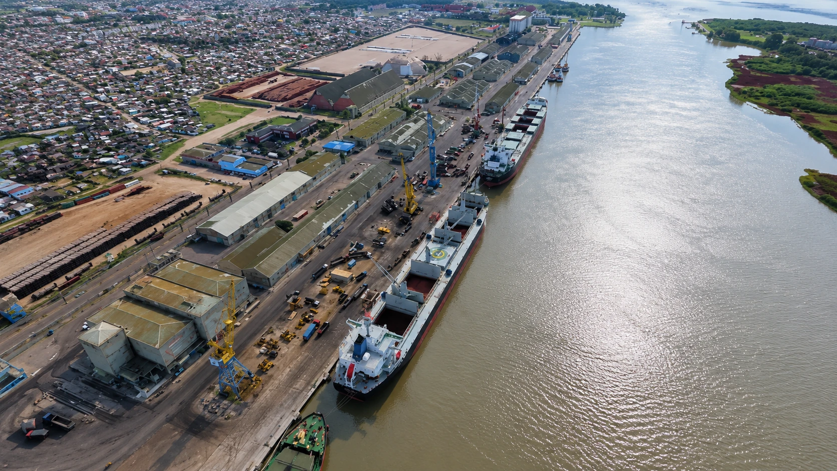 Cargo vessel navigating the access channel at the Port of Rio Grande in Rio Grande do Sul, Brazil.