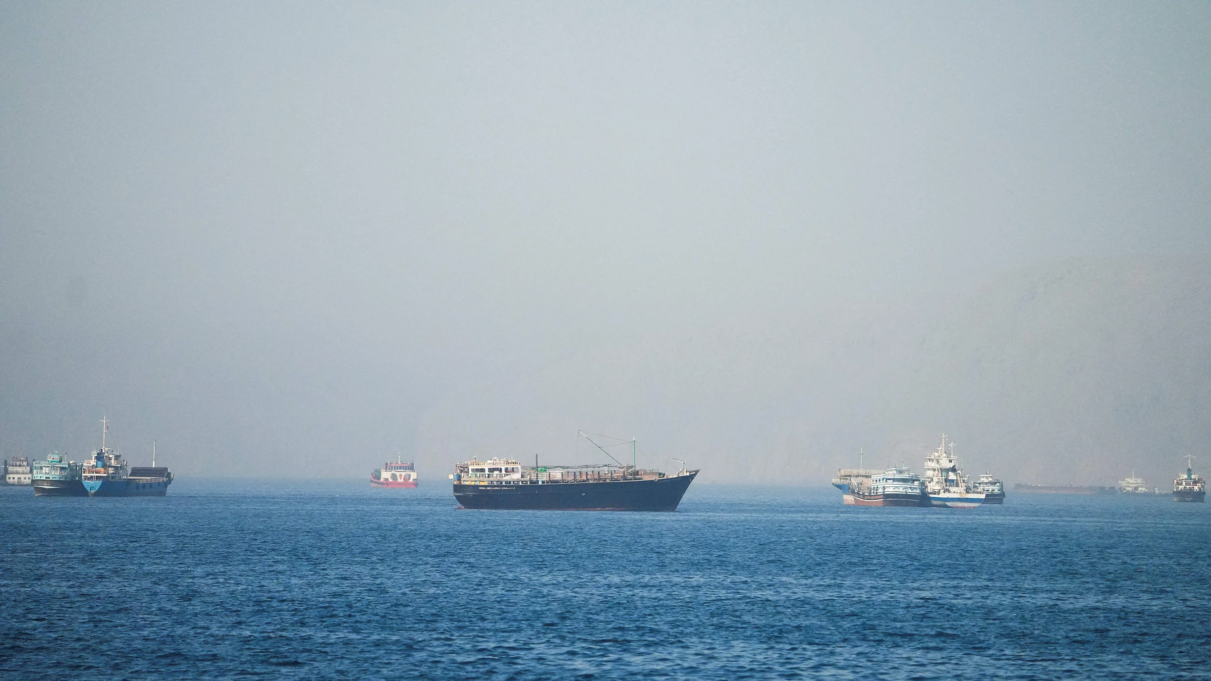 Commercial oil tanker underway in open water near the Strait of Hormuz approaches.